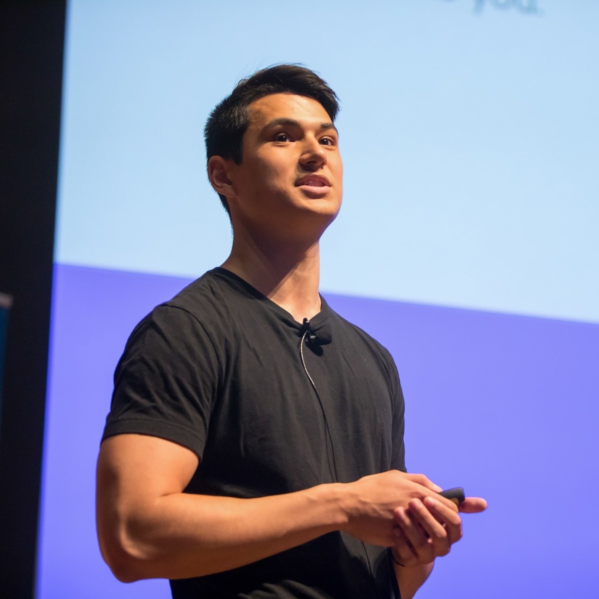 Lucas Tyson speaking at an event